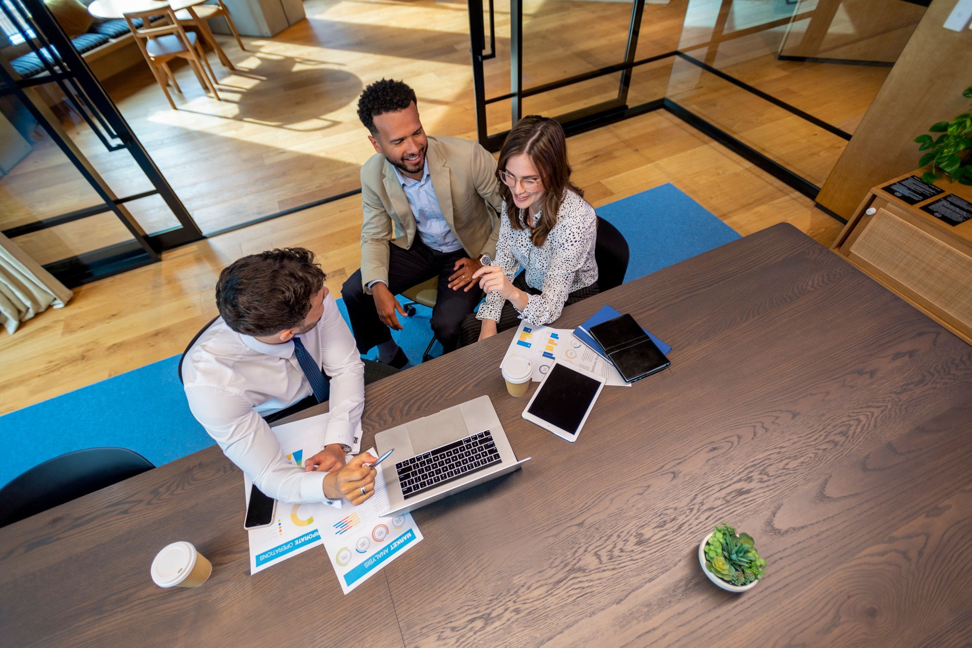 Financial advisor or lawyer with couple explaining options